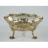 George V hallmarked silver gilt bonbon dish with pierced decoration, raised on four pad feet,