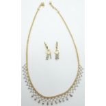 A 14ct bi-coloured gold necklace and matching earrings by Midas, 14.9g