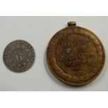 R.Tripp and Co, Bristol 1811 sixpence token and a WWI medal awarded to K9811 E.Bevan S.P.O R.N