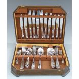 Four stainless steel canteens of cutlery including an Art Deco style set with green handles