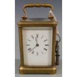 Late 19thC brass carriage clock in corniche style case, with white Roman dial and Breguet style