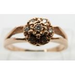A 14ct rose gold ring set with diamonds, size N