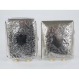 Two curved hallmarked silver cigarette cases with engraved decoration, 178g
