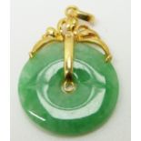 A jadeite disc with 18ct gold pendant fittings
