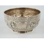 Victorian hallmarked silver pedestal bowl repoussé decorated in the Indian or Burmese style,