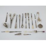 Hallmarked silver handled button hooks, glove stretchers etc, hallmarked silver teaspoon, Eastern