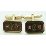 A pair of yellow metal cufflinks each set with two square cut rubies, 8.6g