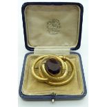 Victorian pinchbeck knot brooch set with a large stone, in J.J.Wood, Richmond box, 5.6 x 3.8cm