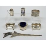 A pair of hallmarked silver salts by Walker & Hall, pedestal salt by the same maker, two peppers,