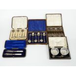 A quantity of cased cutlery including a set of six hallmarked silver teaspoons, weight 31g, a pair