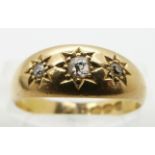 Victorian 18ct gold ring set with three old cut diamonds in star settings, Birmingham 1890, size O