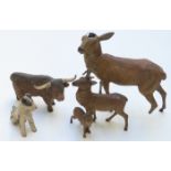 Four cold painted spelter animals including deer, terrier etc, largest 15cm tall