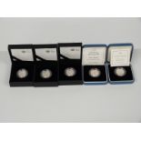 Five silver proof one pound coins including 1999, 2002, 2011 Edinburgh, 2011 Cardiff and 2010