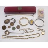 A silver bangle, yellow metal locket, Victorian silver brooch, silver spoon etc