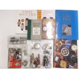 A collection of watches, watch repair tools and watch books including The Classic Watch,
