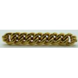An 18ct gold curb link brooch, 8g