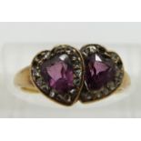 Victorian ring set with two heart cut amethysts surrounded by rose cut diamonds, size I