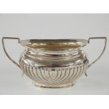 George V hallmarked silver twin handled sugar bowl with reeded decoration, Sheffield 1920, length