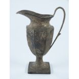 George V hallmarked silver pedestal jug with octagonal body, Birmingham 1922 maker's mark rubbed,
