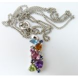 A 9ct white gold pendant set with heart cut topaz, citrine, peridot, amethyst, diamonds on a 9ct