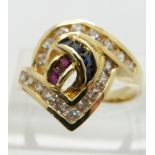 A 14ct gold ring set with square cut cubic zirconia, sapphires and rubies