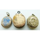 Three Victorian lockets, one with engine turned detail and enamel grape decoration, another with a