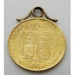 An 1887 gold half sovereign in pendant mount, 4.18g