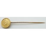 A one dollar United States gold coin mounted on a stick pin, 2.6g