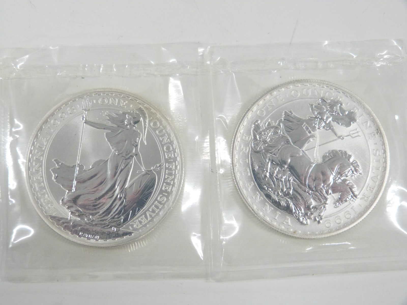 1998 one ounce silver Britannia and a 1999 example