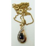 A 9ct gold pendant set with a sapphire and diamonds, originally bought from Beaverbrooks, 2.4g