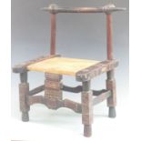 A carved child's chair with steel finials and "Reunion 1971" to base of seat, the frame with