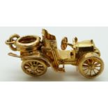 A 9ct gold motor car charm/ pendant, 12.3g, 3.1cm long