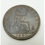 1860 Victorian young head bronze penny, LCW below shield, four windows to lighthouse, thumb touching