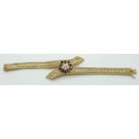 An 18ct gold bracelet set with six diamonds, each approximately 0.2ct in a cluster, surrounded by