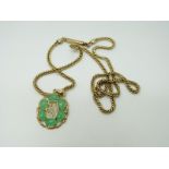 A 9ct gold necklace with 14k gold pendant set with jadeite cabochons, 11.2g