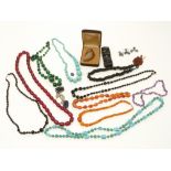 A collection of beaded necklaces including malachite, amber, agate, jet etc