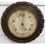 A circular aneroid barometer, c1930s, by Castle and Co, Hull, the painted ivory coloured dial with