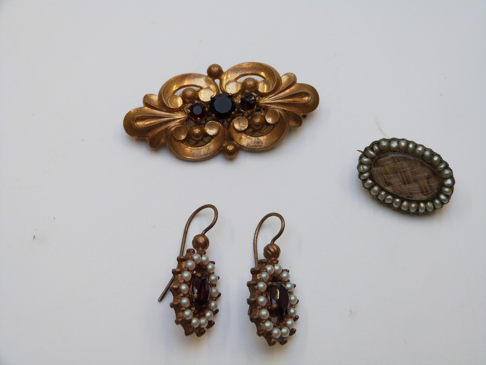 A collection of costume jewellery including glass necklace, Victorian brooch set with plaited - Image 6 of 7