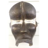 A 19thC / 20thC African tribal mask, height 30cm