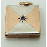 A bi-coloured rose gold locket set with blue paste, 5.9g