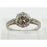 Art Deco platinum ring set with a round cut diamond of approximately 1.4ct with diamond encrusted