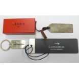 Boxed Links of London hallmarked silver keyring, hallmarked silver Concorde luggage tag and a
