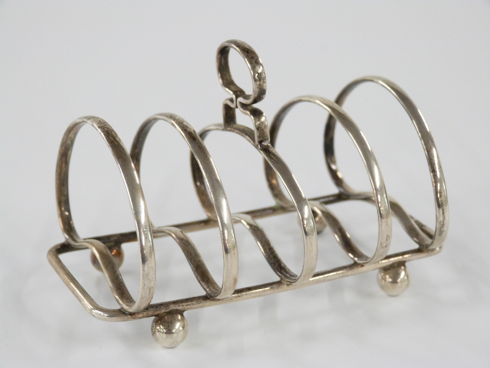 George V hallmarked silver five bar toast rack, London 1912 maker Harrison Brothers & Howson, length