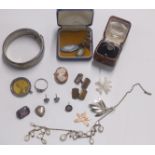 A collection of silver jewellery including a bangle, marcasite ring in vintage box, brooch,