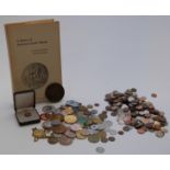 A large quantity of US coins and tokens and a book on US trade tokens