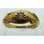 Edwardian 18ct gold ring set with a diamond in a star setting, Birmingham 1904