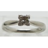 A platinum ring set with a princess cut diamond of approximately 0.35ct, size J