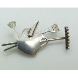 A hallmarked silver gardening themed brooch by NM