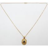 An 18ct gold pendant set with a sapphire cabochon and diamonds, 4.8g