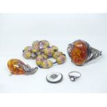 A silver bangle set with pressed amber, pressed amber pendant, silver ring, Venetian beads etc.